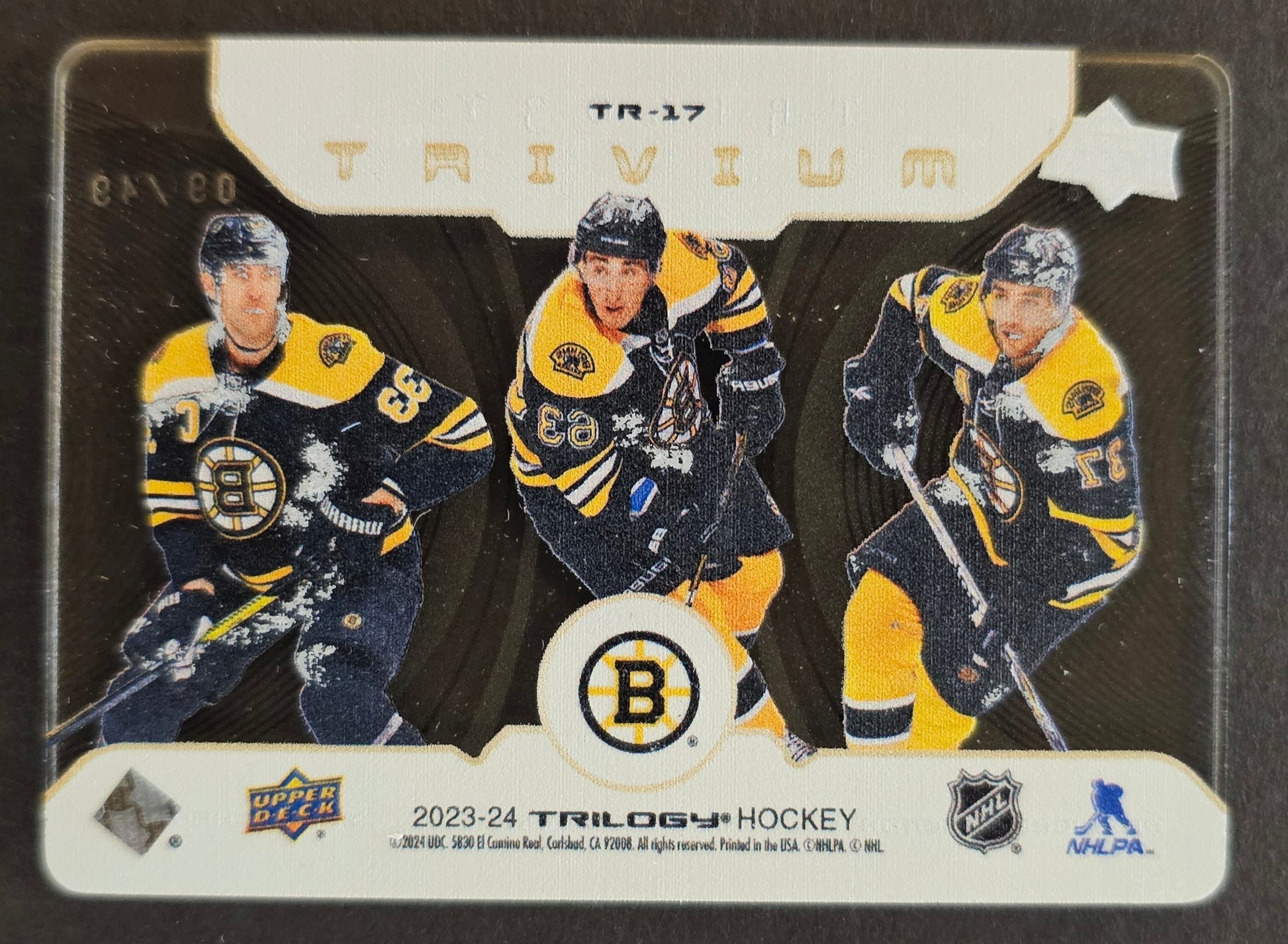 Bergeron/Marchand/Chara Trivium /49 - 2023/24 Trilogy